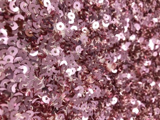 Materiał cekinowy cekiny na tiulu gęste brudny róż