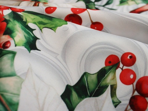 Tkanina obrusowa plamoodporna świąteczna kolorowe gwiazdy betlejemskie na białym